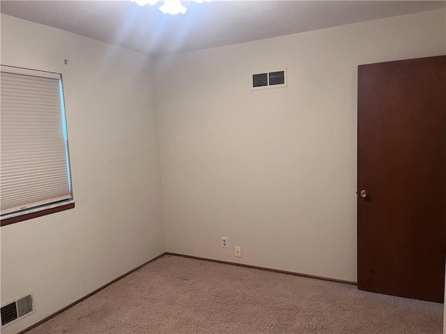 11510 Ridge Dr, Sugar Creek, MO 64054 - unfurnished room with light colored carpet and baseboards
