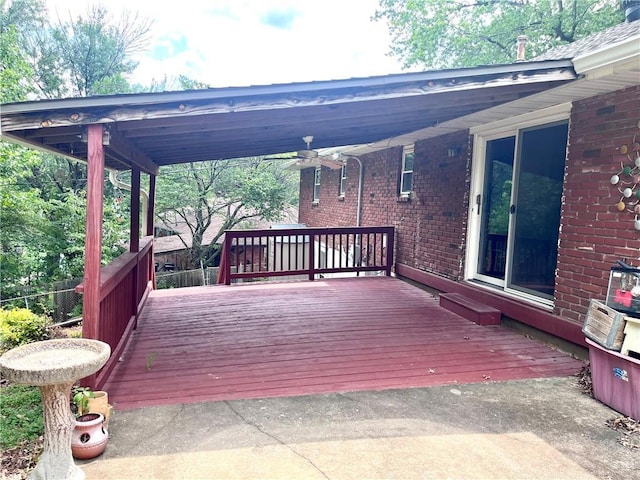 11510 Ridge Dr, Sugar Creek, MO 64054 - wooden deck with a ceiling fan and a carport