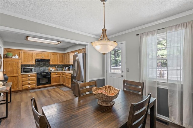 1413 SE 1st Ter, Lees Summit, MO 64063 - dining room with a textured ceiling, dark wood-style floors, and crown molding