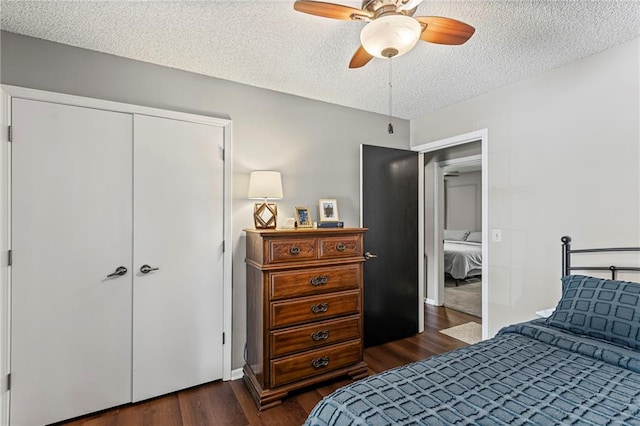 1413 SE 1st Ter, Lees Summit, MO 64063 - bedroom with dark wood finished floors, a textured ceiling, a closet, and a ceiling fan