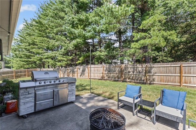 1413 SE 1st Ter, Lees Summit, MO 64063 - fenced backyard featuring an outdoor fire pit, a patio, and a grill