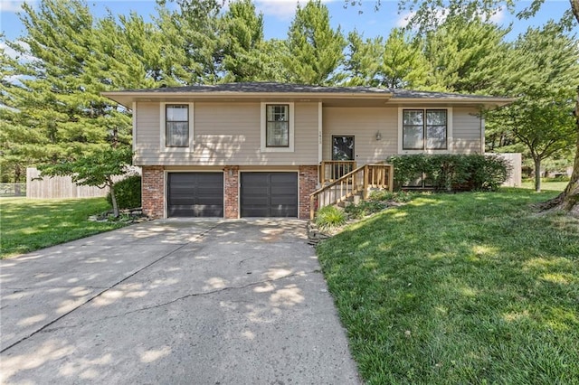 1413 SE 1st Ter, Lees Summit, MO 64063 - bi-level home featuring brick siding, driveway, and an attached garage
