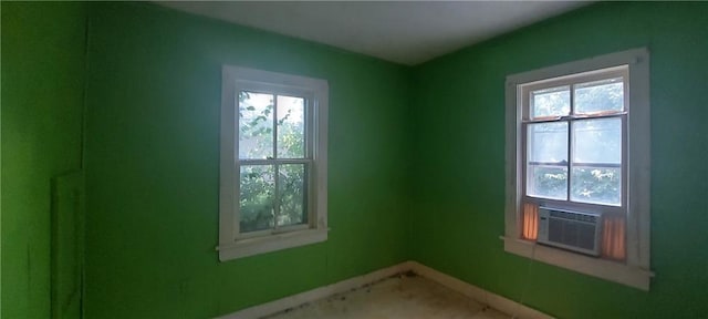 214 S Ridgeview Rd, Olathe, KS 66061 - spare room featuring cooling unit and baseboards