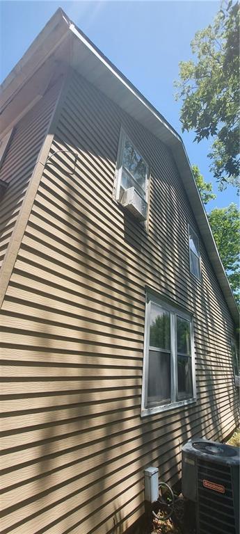 214 S Ridgeview Rd, Olathe, KS 66061 - view of side of property featuring a central air condition unit