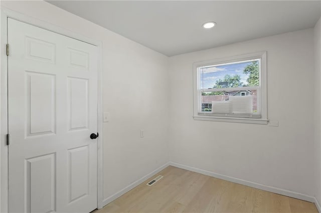 2 Overhill Dr, Paola, KS 66071 - unfurnished room featuring light wood-style flooring and recessed lighting