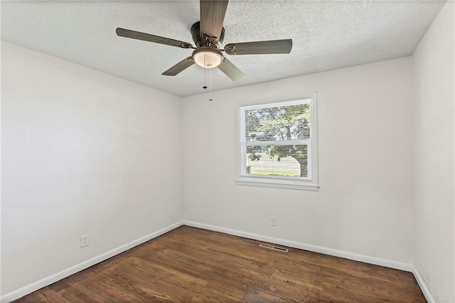 2 Overhill Dr, Paola, KS 66071 - spare room featuring wood finished floors, a textured ceiling, and ceiling fan