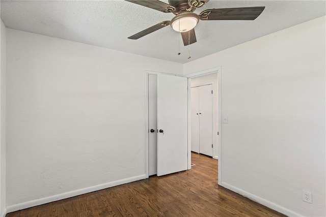 2 Overhill Dr, Paola, KS 66071 - spare room with wood finished floors and ceiling fan