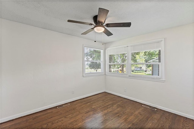 2 Overhill Dr, Paola, KS 66071 - unfurnished room with wood finished floors, a textured ceiling, and ceiling fan