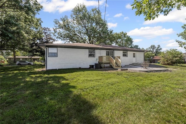 2 Overhill Dr, Paola, KS 66071 - back of house with a patio and a yard
