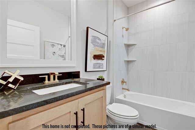 11275 S Gleason Rd, Olathe, KS 66061 - bathroom featuring vanity and tub / shower combination