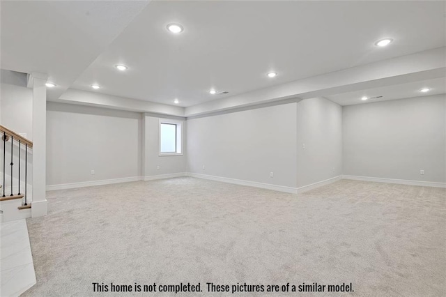 11275 S Gleason Rd, Olathe, KS 66061 - basement featuring light colored carpet, stairs, and recessed lighting