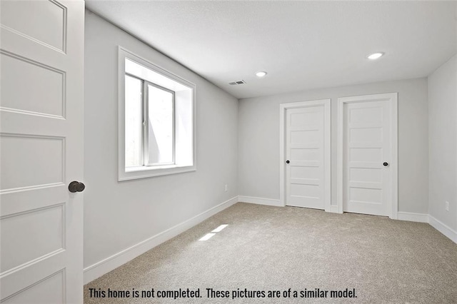 11275 S Gleason Rd, Olathe, KS 66061 - unfurnished bedroom featuring carpet flooring and recessed lighting