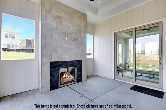 11275 S Gleason Rd, Olathe, KS 66061 - living room with ornamental molding, a tile fireplace, and ceiling fan