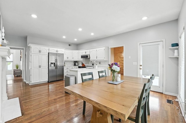 5136 NE Ash Grove Dr, Lees Summit, MO 64064 - dining room featuring wood finished floors and recessed lighting