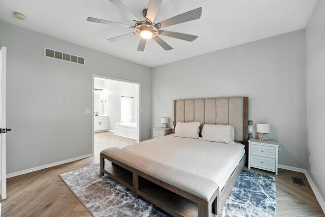 5136 NE Ash Grove Dr, Lees Summit, MO 64064 - bedroom featuring connected bathroom and ceiling fan