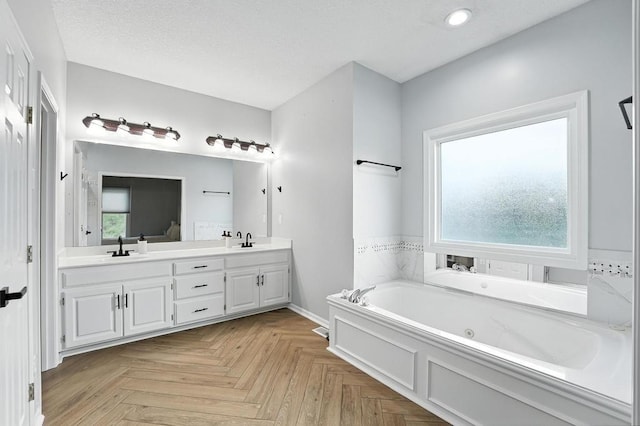 5136 NE Ash Grove Dr, Lees Summit, MO 64064 - full bath featuring plenty of natural light, a tub with jets, double vanity, and recessed lighting