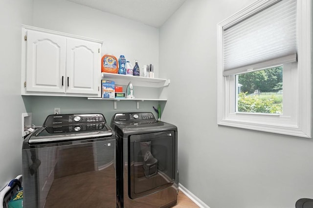 5136 NE Ash Grove Dr, Lees Summit, MO 64064 - washroom with cabinet space and washing machine and dryer
