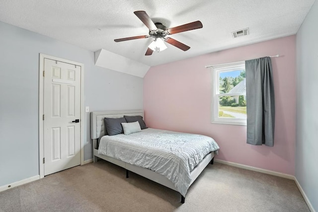 5136 NE Ash Grove Dr, Lees Summit, MO 64064 - bedroom featuring carpet floors, a ceiling fan, and a textured ceiling