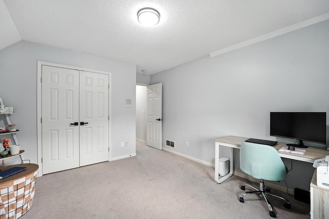 5136 NE Ash Grove Dr, Lees Summit, MO 64064 - carpeted office space featuring a textured ceiling and vaulted ceiling