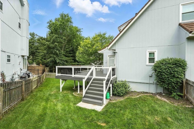 5136 NE Ash Grove Dr, Lees Summit, MO 64064 - fenced backyard featuring a wooden deck