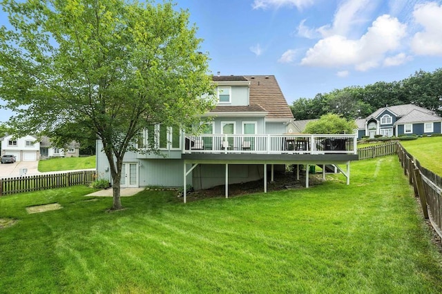 5136 NE Ash Grove Dr, Lees Summit, MO 64064 - back of house with a deck, a fenced backyard, and french doors