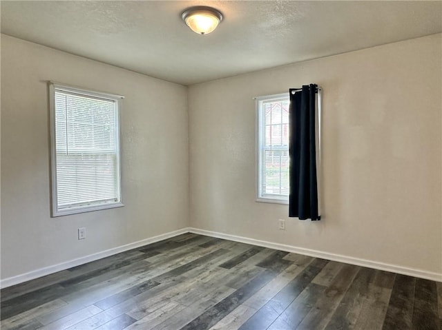 400 Webster St, Chillicothe, MO 64601 - empty room with dark wood-style flooring