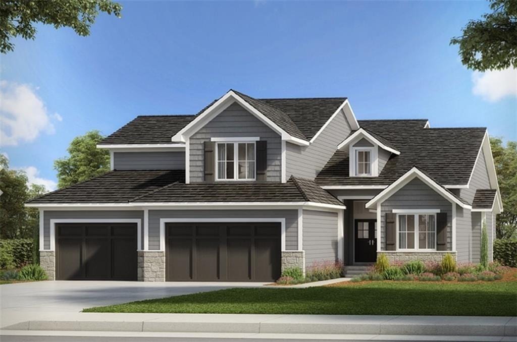 17705 Knox St, Overland Park, KS 66013 - view of front facade featuring stone siding, concrete driveway, and a front lawn