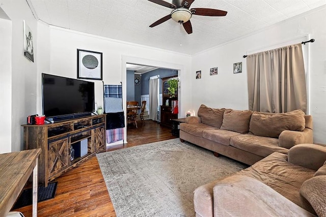 1312 N Main St, Nevada, MO 64772 - living area with ceiling fan and hardwood / wood-style floors