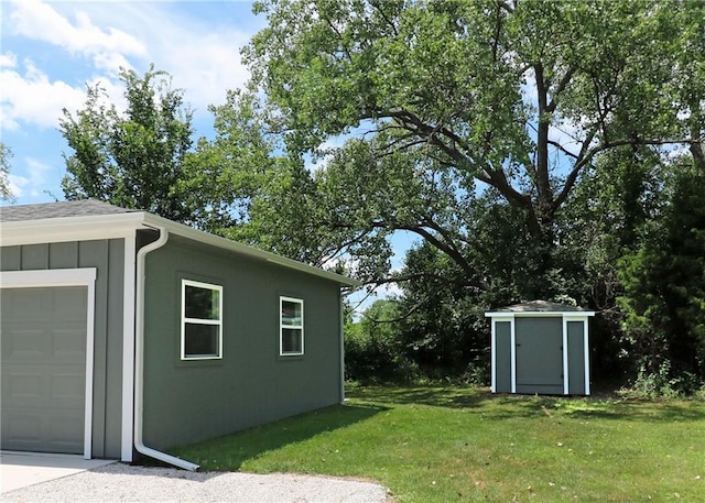 901 School Rd, Peculiar, MO 64078 - view of green lawn with a shed