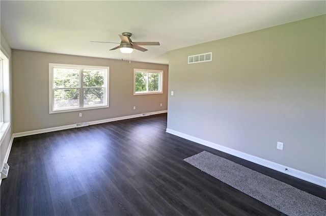 901 School Rd, Peculiar, MO 64078 - unfurnished room with ceiling fan and dark wood-style floors