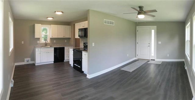 901 School Rd, Peculiar, MO 64078 - kitchen featuring black appliances, white cabinets, ceiling fan, and dark wood-type flooring