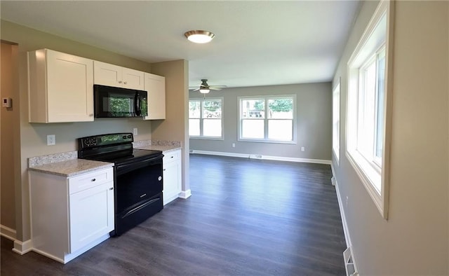 901 School Rd, Peculiar, MO 64078 - kitchen featuring black appliances, dark wood-style flooring, a ceiling fan, and white cabinetry