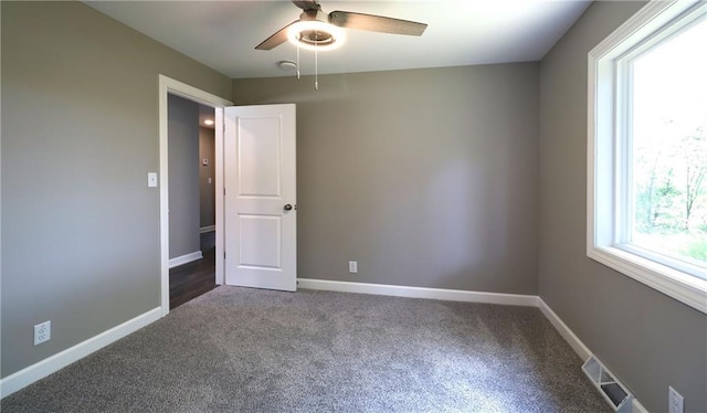 901 School Rd, Peculiar, MO 64078 - unfurnished room with ceiling fan and carpet