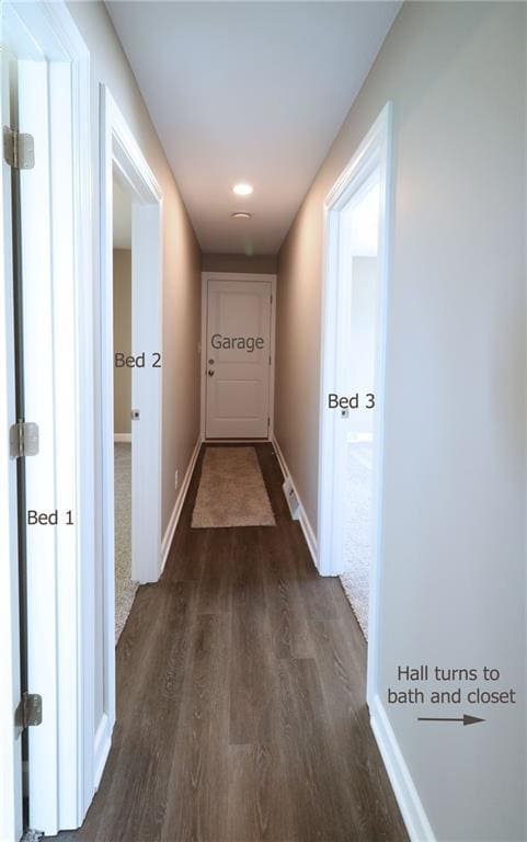 901 School Rd, Peculiar, MO 64078 - hall with dark wood finished floors and baseboards