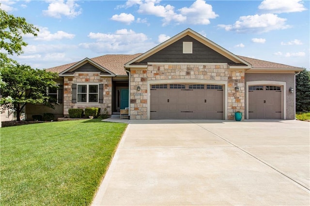 22908 E 41st Ter S, Blue Springs, MO 64015 - craftsman-style house with a garage, concrete driveway, a front lawn, and stone siding