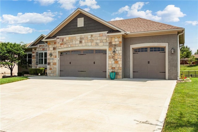 22908 E 41st Ter S, Blue Springs, MO 64015 - craftsman inspired home with driveway, an attached garage, stone siding, and roof with shingles
