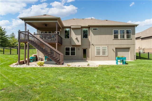 22908 E 41st Ter S, Blue Springs, MO 64015 - rear view of house with stairs, ceiling fan, a patio area, a wooden deck, and an attached garage