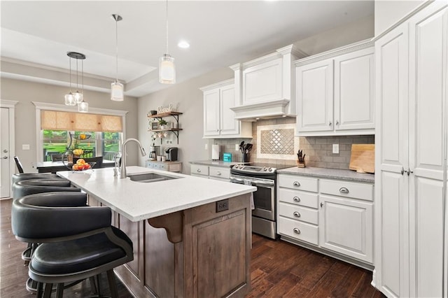 22908 E 41st Ter S, Blue Springs, MO 64015 - kitchen featuring electric stove, dark wood-style flooring, decorative backsplash, white cabinets, and a breakfast bar area