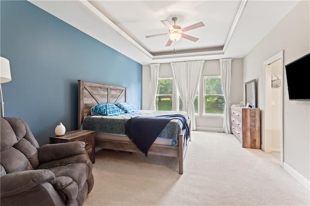 22908 E 41st Ter S, Blue Springs, MO 64015 - carpeted bedroom with a tray ceiling and a ceiling fan