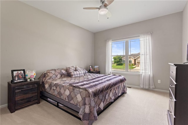 22908 E 41st Ter S, Blue Springs, MO 64015 - bedroom with light colored carpet and a ceiling fan