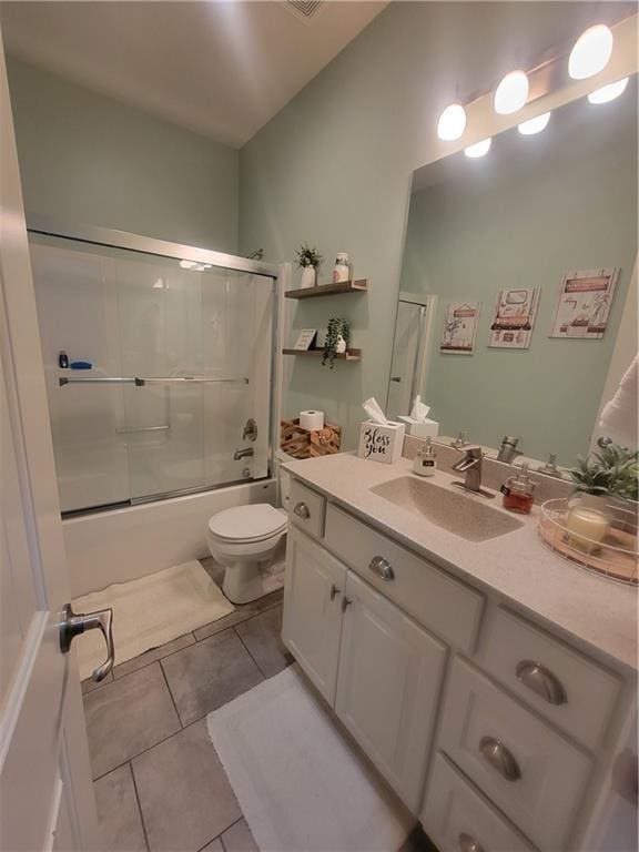 22908 E 41st Ter S, Blue Springs, MO 64015 - full bathroom featuring vanity, tile patterned floors, and combined bath / shower with glass door