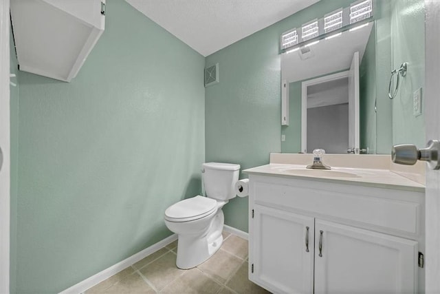 518 NE 6th St Unit A, Blue Springs, MO 64014 - bathroom featuring a textured wall, vanity, tile patterned floors, and a textured ceiling