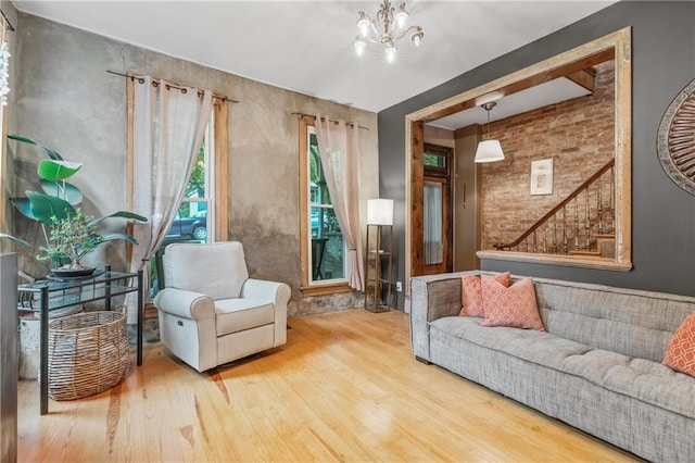 1637 Jefferson St, Kansas City, MO 64108 - living room with wood finished floors and a chandelier