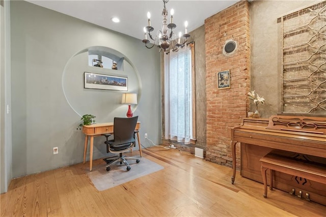 1637 Jefferson St, Kansas City, MO 64108 - office with wood finished floors and a chandelier