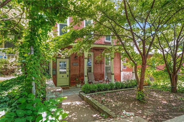 1637 Jefferson St, Kansas City, MO 64108 - obstructed view of property with brick siding