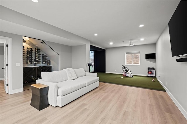 1213 NE Goshen Dr, Lees Summit, MO 64064 - living area featuring light wood-style flooring and recessed lighting