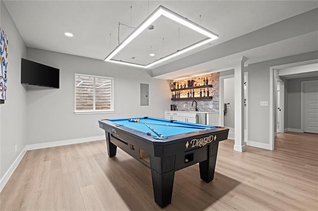 1213 NE Goshen Dr, Lees Summit, MO 64064 - playroom featuring wet bar, light wood-style flooring, billiards, electric panel, and recessed lighting