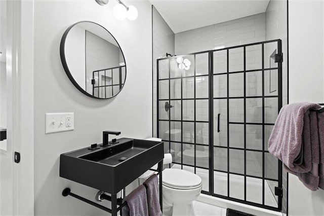 1213 NE Goshen Dr, Lees Summit, MO 64064 - bathroom featuring a stall shower and toilet