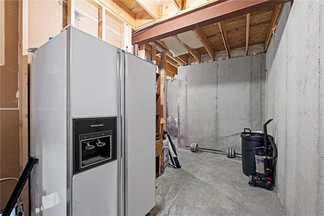 1213 NE Goshen Dr, Lees Summit, MO 64064 - unfinished below grade area with white fridge with ice dispenser