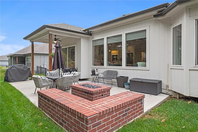 1213 NE Goshen Dr, Lees Summit, MO 64064 - view of patio / terrace featuring a fire pit, grilling area, and a ceiling fan